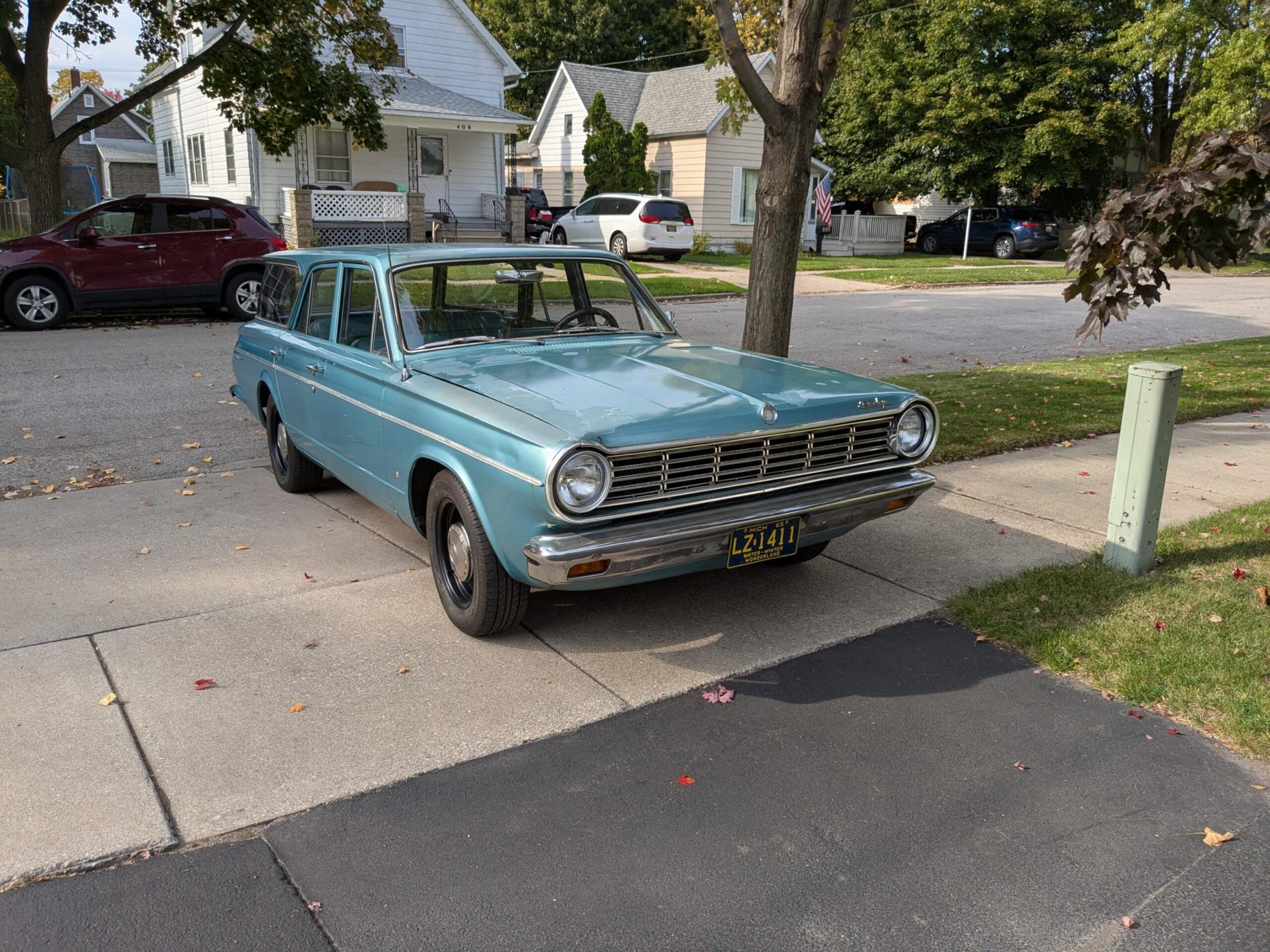 Image of 1965 Dodge Dart 170 Wagon in a residential setting